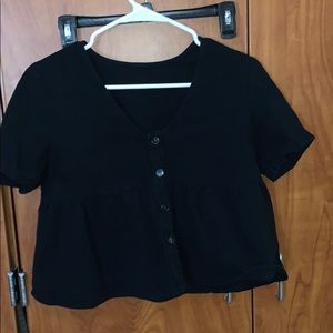 black peplum slightly cropped top